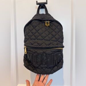 Moschino Quilted Black Backpack with Gold Accents
